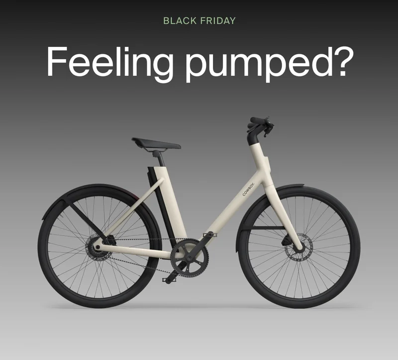 A graphic. A promotional image of a Cowboy e-bike with the text “Black Friday” at the top and “Feeling pumped?” displayed prominently, showcasing a minimalist cream-colored bike against a gradient background.