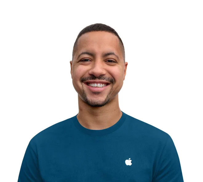 Apple Specialist smiling with an approachable demeanor
