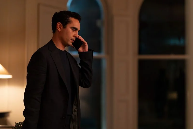 Image may contain: Max Minghella, Head, Person, Face, Adult, Sad, Electronics, Mobile Phone, Phone, Clothing, and Formal Wear