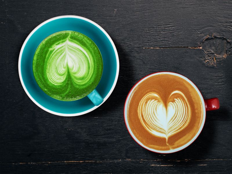 Image may contain: coffee vs. matcha, Beverage, Coffee, Coffee Cup, Latte Art, Plate, and Cup