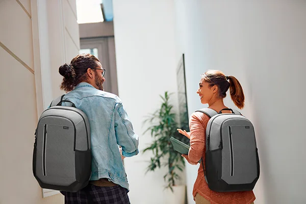 Students walking with Dell Pro 14 16 Plus EcoLoop Urban Backpack CP5625G on.