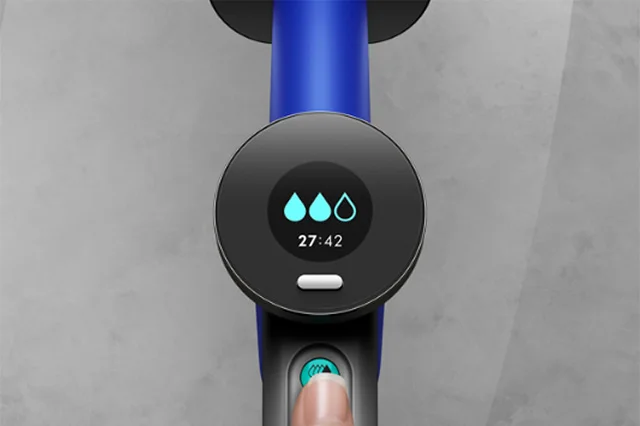 A close-up of the Dyson WashG1's LCD screen hydration icons