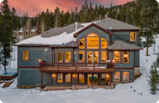 Unwind in a spacious mountain lodge with a snow-dusted backdrop in Breckenridge, Colorado.