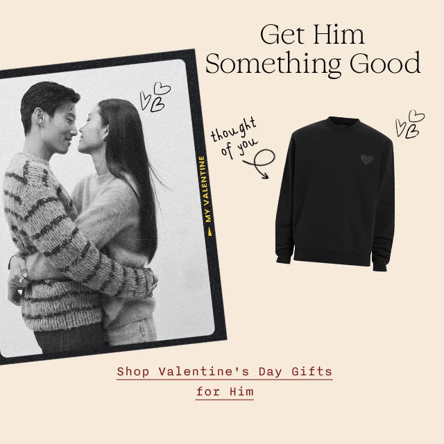 Get him something good. A man and woman embracing and a black sweatshirt.