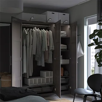 Open dark gray PAX wardrobe