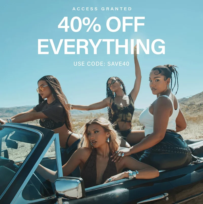 Four fashionable women in diverse summer outfits pose in a black convertible. Get 40% off all apparel with code discount code!