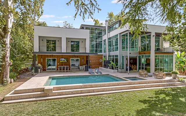 Recharge by the pool in a sleek vacation rental in Austin, Texas.