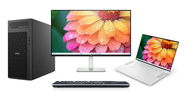 A Dell desktop computer, monitor, wireless keyboard and laptop computer.