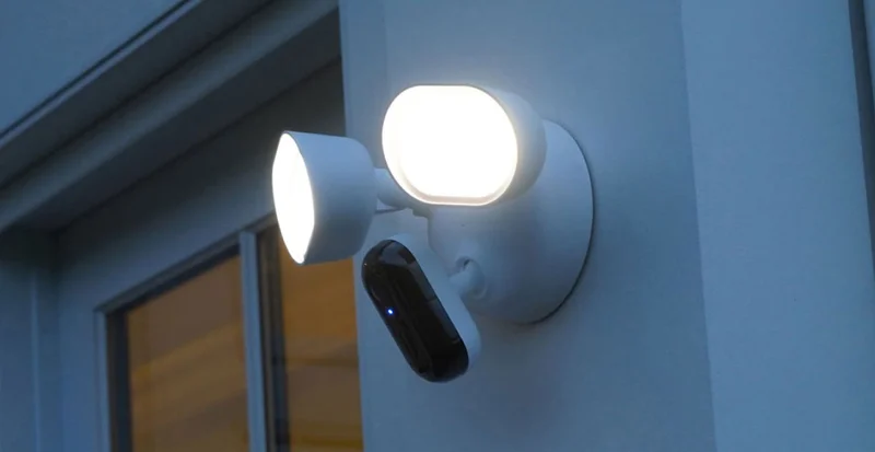 Arlo Wired Floodlight mounted on the exterior of a home.