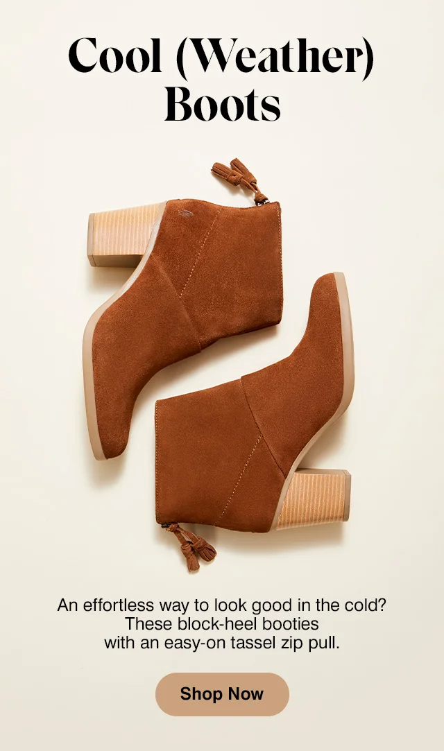 Pair of women’s tan suede Ingrid booties with block heels and easy-on tassel zip pulls. Shop all shoes..