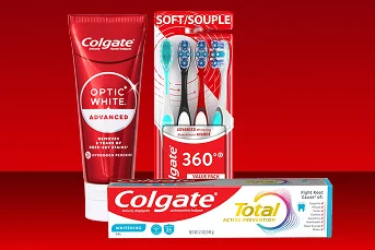 A variety of Colgate oral care products against a red background.