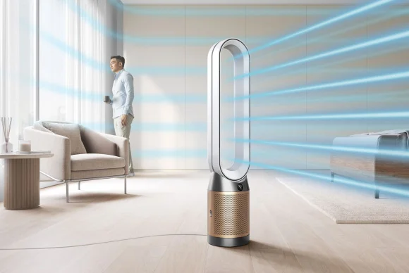 Dyson Purifier Cool PC2 De-NOx projecting clean air in a bedroom