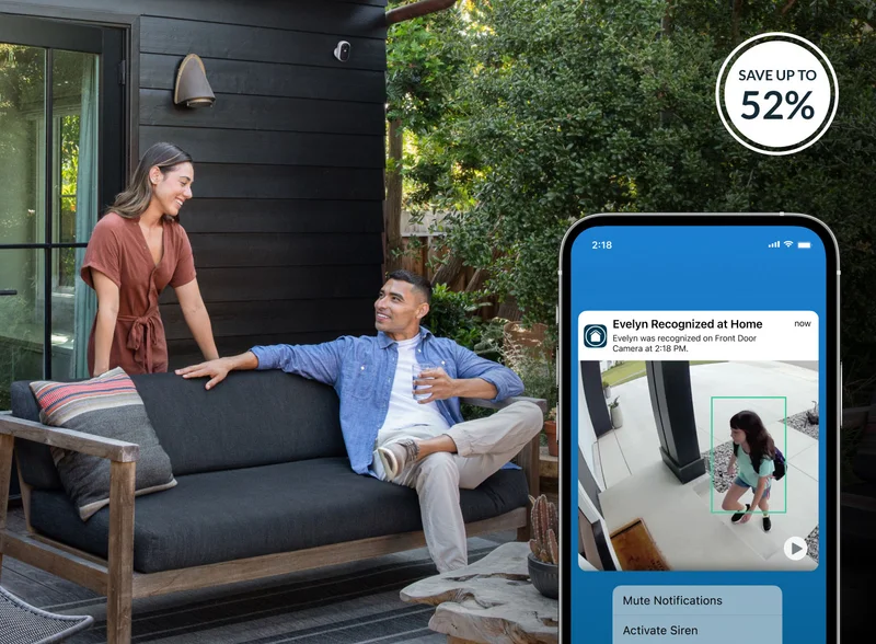 Up to 52% off. Phone displaying a simulated Arlo screen image of an Arlo Secure notification. People sitting outside with an Arlo security camera mounted on the exterior of the home.