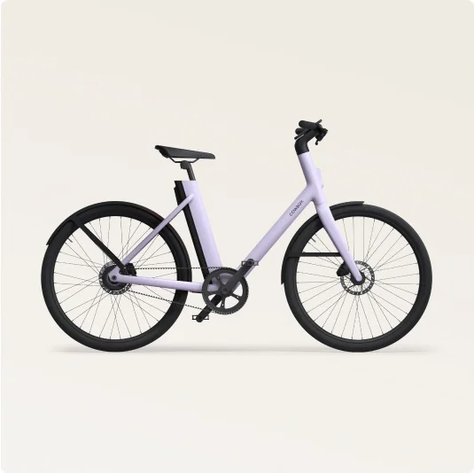 Side view of the Cowboy Cruiser ST e-bike in Lavender, with a step-through frame for easier accessibility and modern styling.