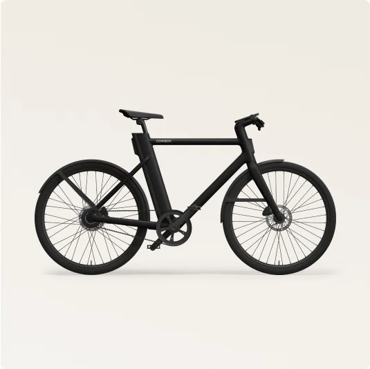 Side view of the Cowboy Classic e-bike in Black, featuring a minimalist frame design and integrated components.