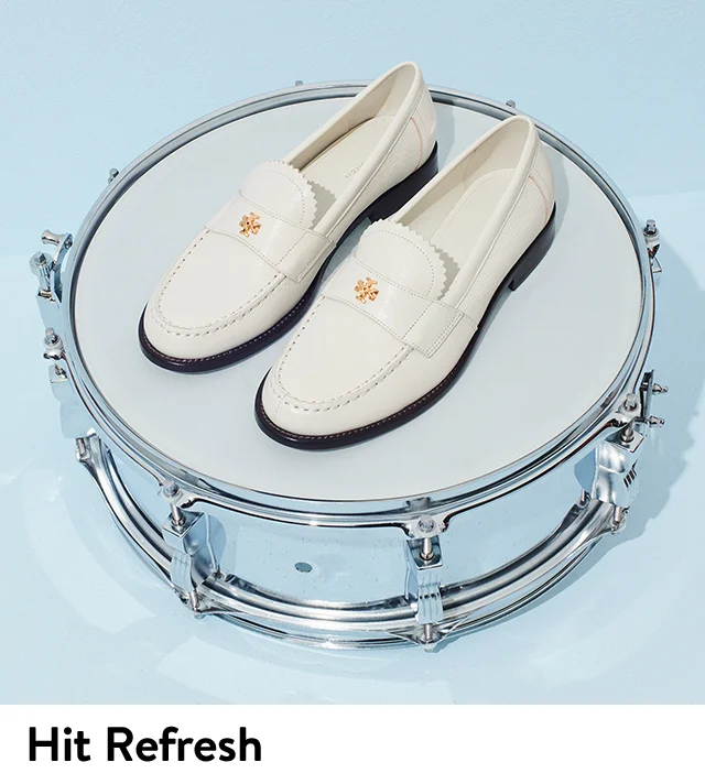 White Tory Burch loafers.