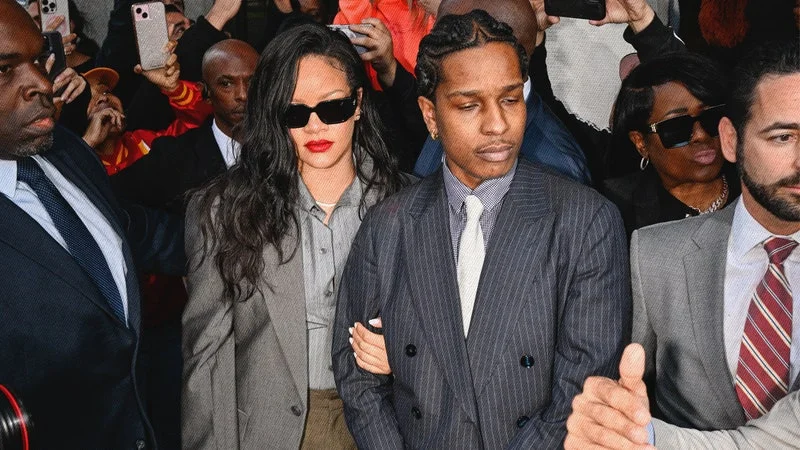 Image may contain: A$AP Rocky, Patrice Quarteron, Jonathan Larson, Rihanna, Accessories, Formal Wear, Tie, Glasses, and Adult
