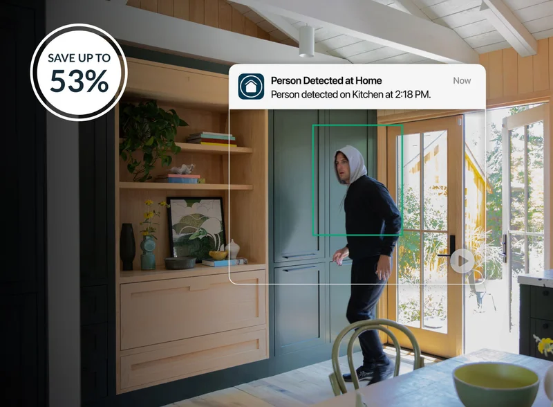 Up to 53% off. Image of burglar entering home with a simulated user interface showing an Arlo Secure notification detecting that a person was detected at home.