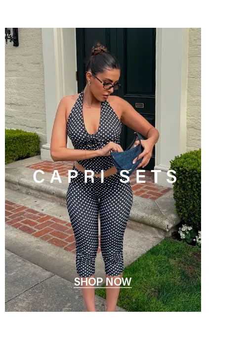 Woman in black polka dot halter top and capri set. Shop trendy women's two-piece outfits, perfect for summer fashion!