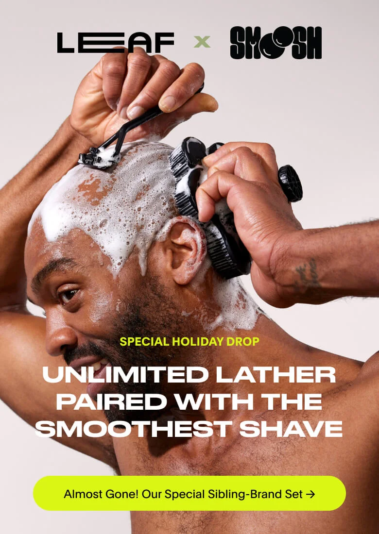 Man shaving his head, using Smoosh Scrubber
