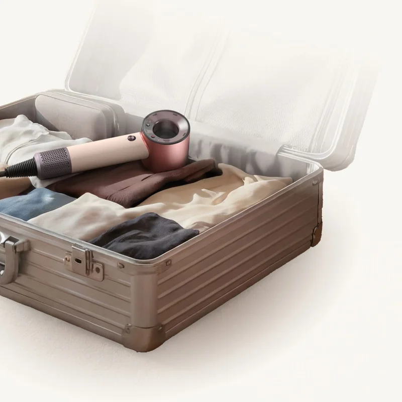 Dyson Supersonic Travel hair dryer in a suitcase