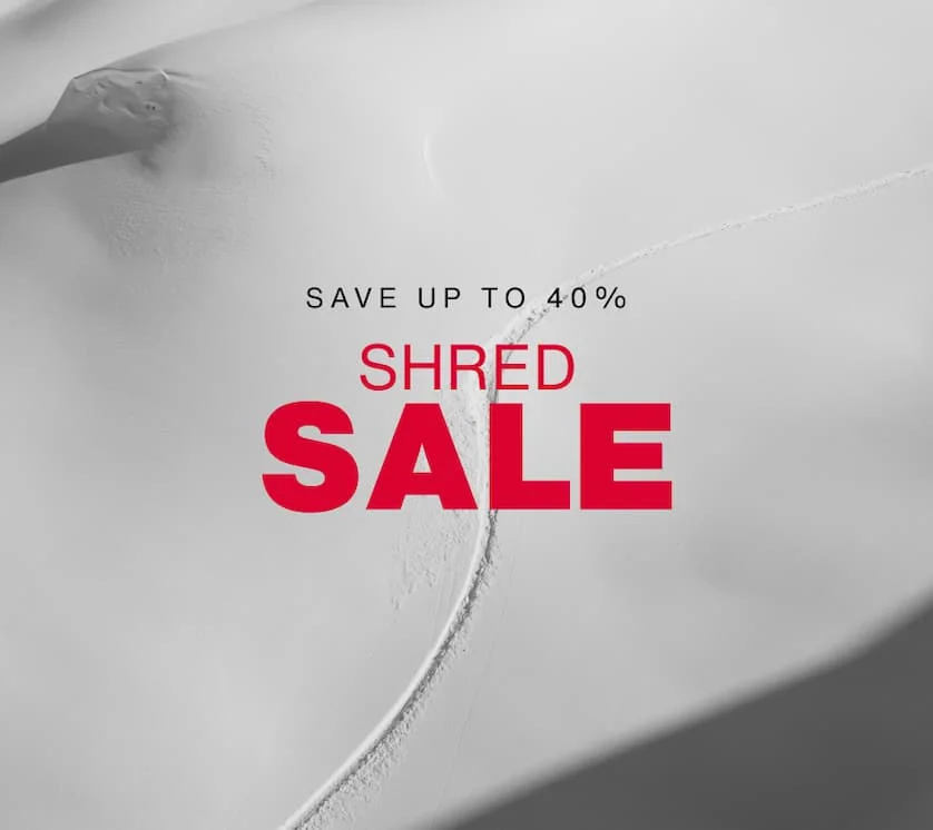 Darkened image of a rider's line in the backcountry. The text SHRED SALE repated in white on a red background a the bottom. Underneath, the text 'Sale runs 3/4-3/11. Save up to 40%'.'