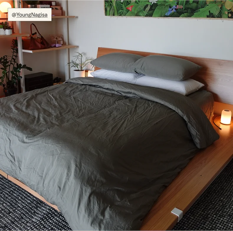 The Bed Frame & Headboard in Oak with the Flow Rug, styled by @YoungNagisa