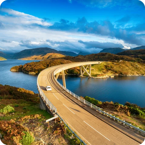 Long highway in California with one car on it