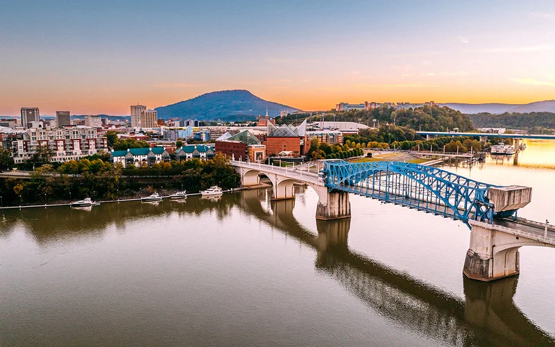 Chattanooga has transformed itself from an industrial hub of iron and steel manufacturers into a city known for its dramatic mountain setting, location on the Tennessee River, and outdoor activities such as hiking, rock climbing, and whitewater rafting.