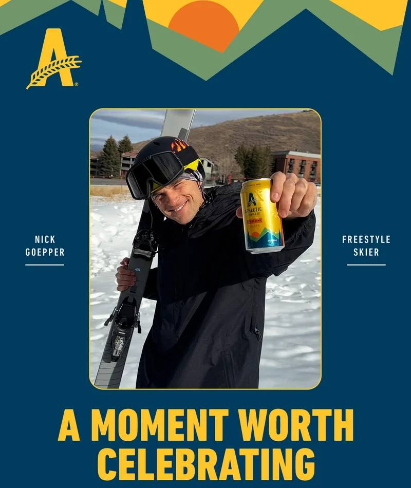an image of a man holding a can of beer and skis