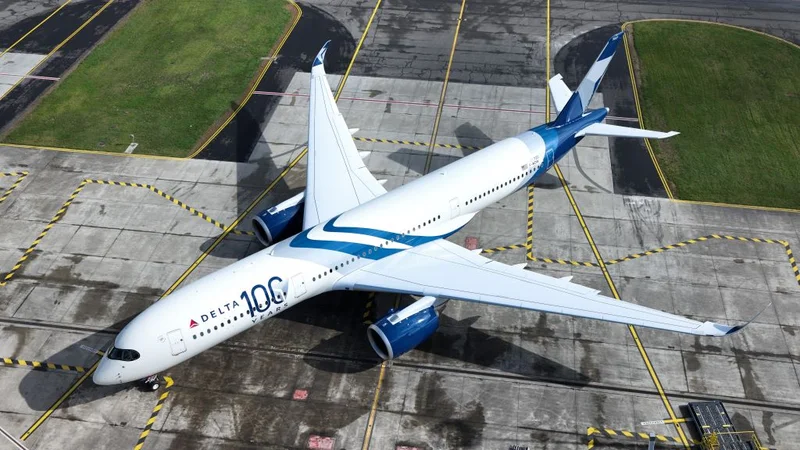 A parked Delta plane with the Centennial livery