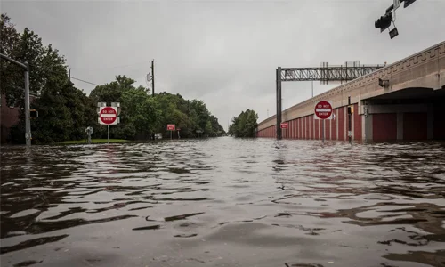 National Geographic photographer Erin Trieb photographed floodwaters at the intersection of Highway 610 and Evergreen Street in Bellaire, Texas, after evacuating her family during Hurricane Harvey.