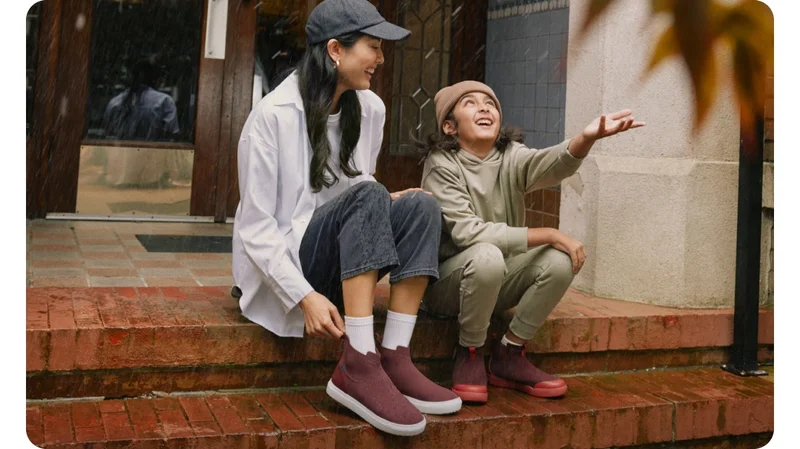Graphic of two girls talking wearing the new Uptown Chelseas.