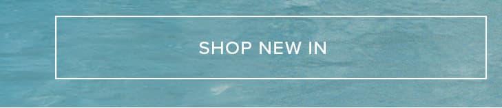 "SHOP NEW IN" button, white text within a border, on a textured teal background, encouraging users to discover the latest products.