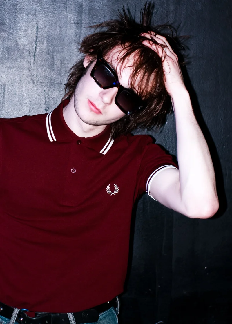Male wearing a M3600 Twin Tipped Fred Perry Shirt in Oxblood / Ecru / Ecru