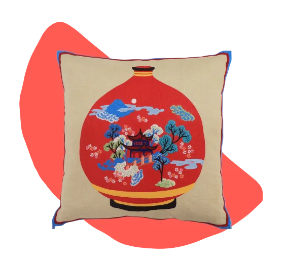 Embroidered still life cushion