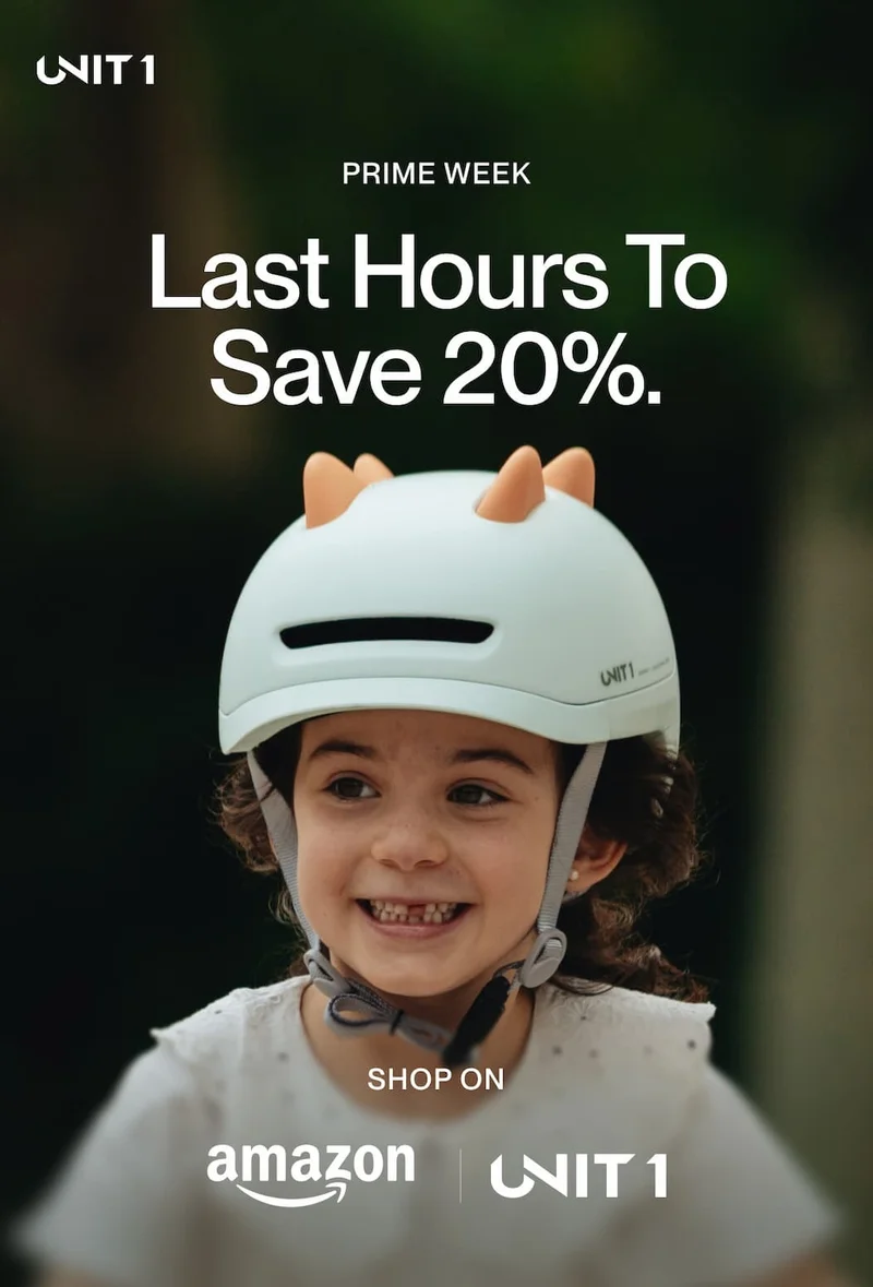 Smiling child wearing UNIT 1 helmet with orange spikes and text: Prime Week – Last Hours To Save 20%. Shop on Amazon and UNIT 1.