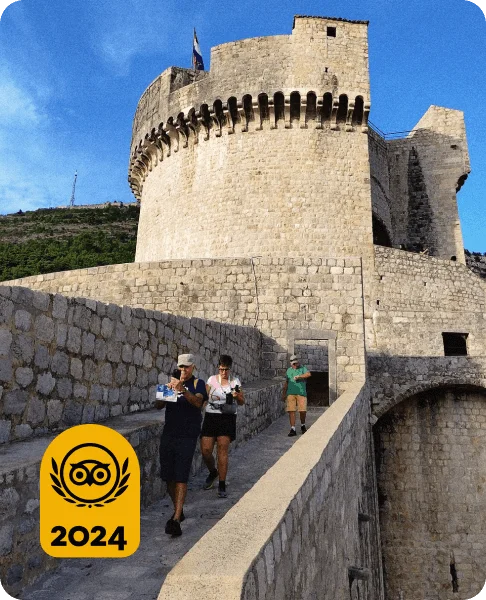Image Description: Travelers exploring a fortress in Dubrovnik’s Old Town