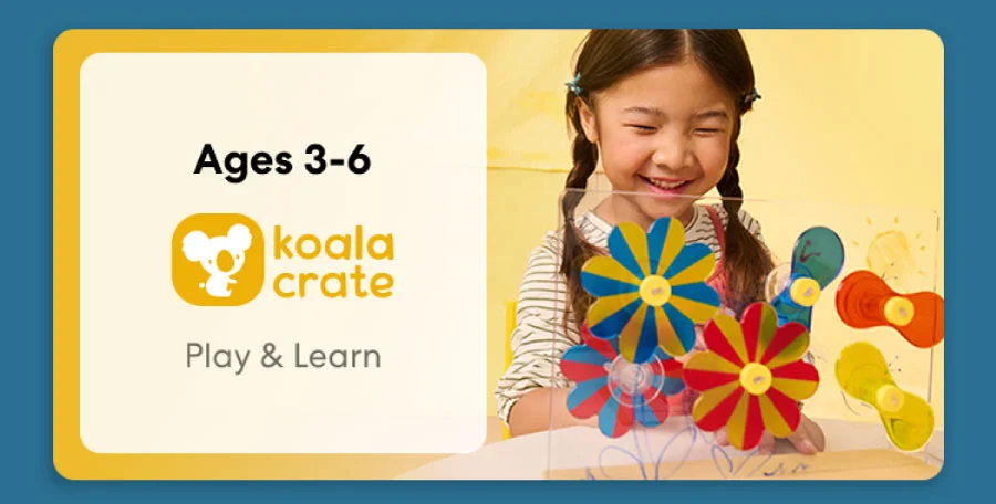 Young child smiling while working on creative KiwiCo Sprout projects, perfect for ages 3–6 for play and learn.