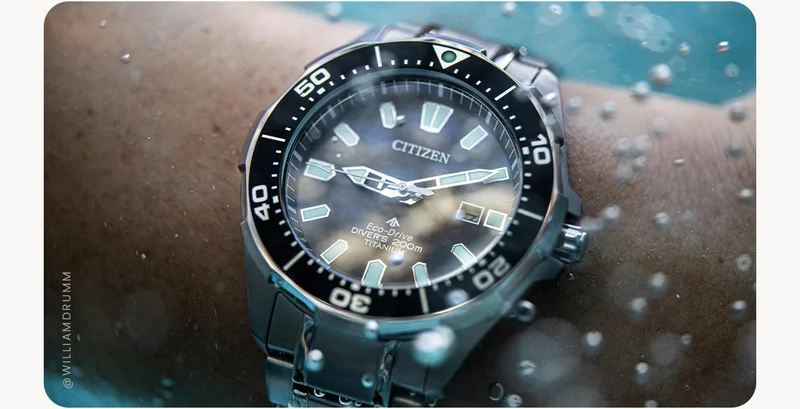 Our Super Titanium™ Promaster Dive watch features durable construction, making it 5x harder and 40% lighter than stainless steel, plus it’s scratch- and rust-resistant. The aluminum bezel houses a striking black dial. [Shot by William Drum]