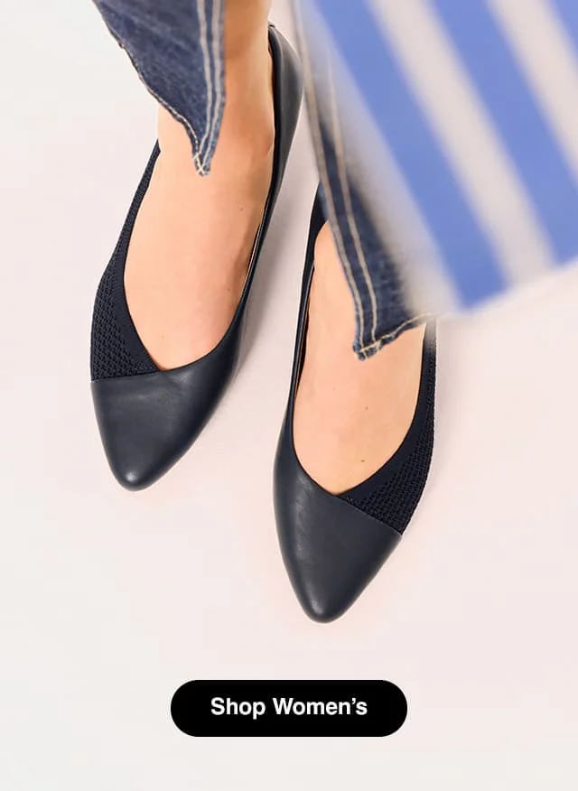 Woman in striped dress and the Gilly pump in Black. Shop Women’s.
