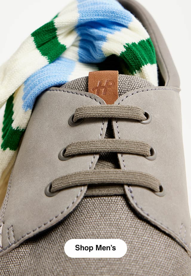 A close-up of the laces on the men’s Bear oxford in Light Grey suede and fabric. Shop Men’s.
