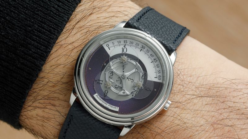 Image may contain: Wristwatch, Arm, Body Part, and Person