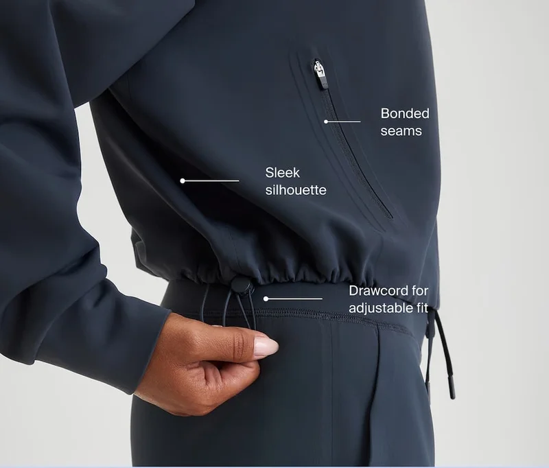 Bonded seams. Sleek silhouette. Drawcord for adjustable fit.