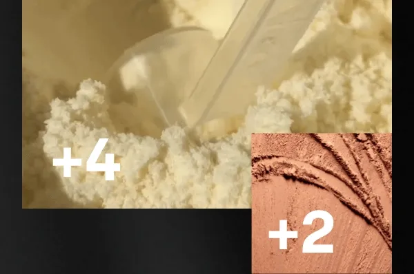 Close-up of ARMRA colostrum powder being scooped, with on-screen text indicating “+4” and “+2” scoops.