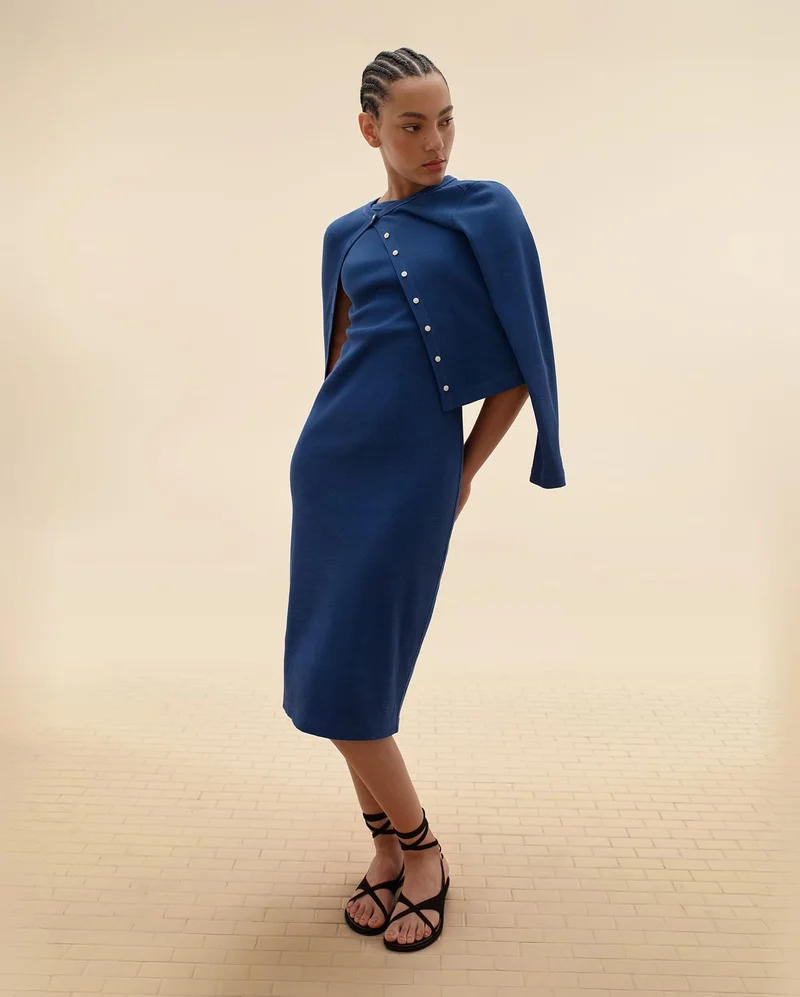 [Editorial Image]Model in The Selfie Cardigan | The Selfie Tank Dress | The Leather Criss-Cross Sandal