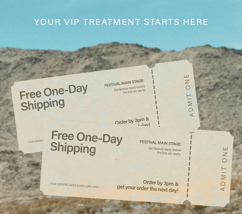 Two cream "Festival Main Stage" tickets on a desert background promoting Free One-Day Shipping. Get festival ready with next-day delivery on orders over $100. VIP treatment starts here!