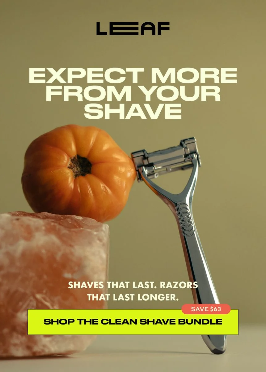Leaf Shave razor artistically arranged with orange pumpkin on marble block against beige background with text 'Expect More From Your Shave'