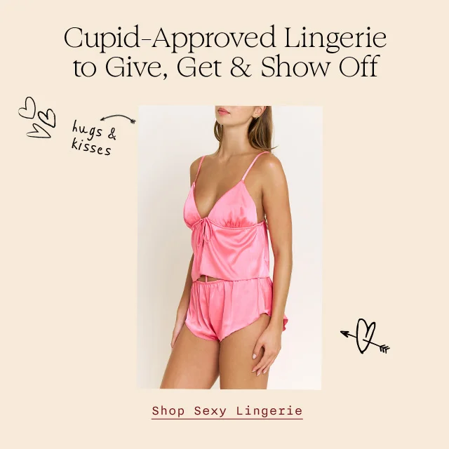 Cupid-approved lingerie to give, get and show off. A woman wearing a pink camisole and matching shorts.