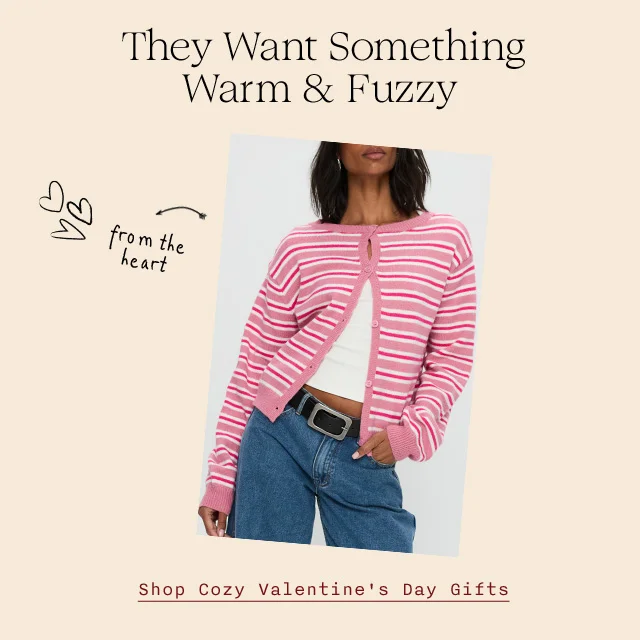 They want something warm and fuzzy. A woman wearing a pink striped cardigan.